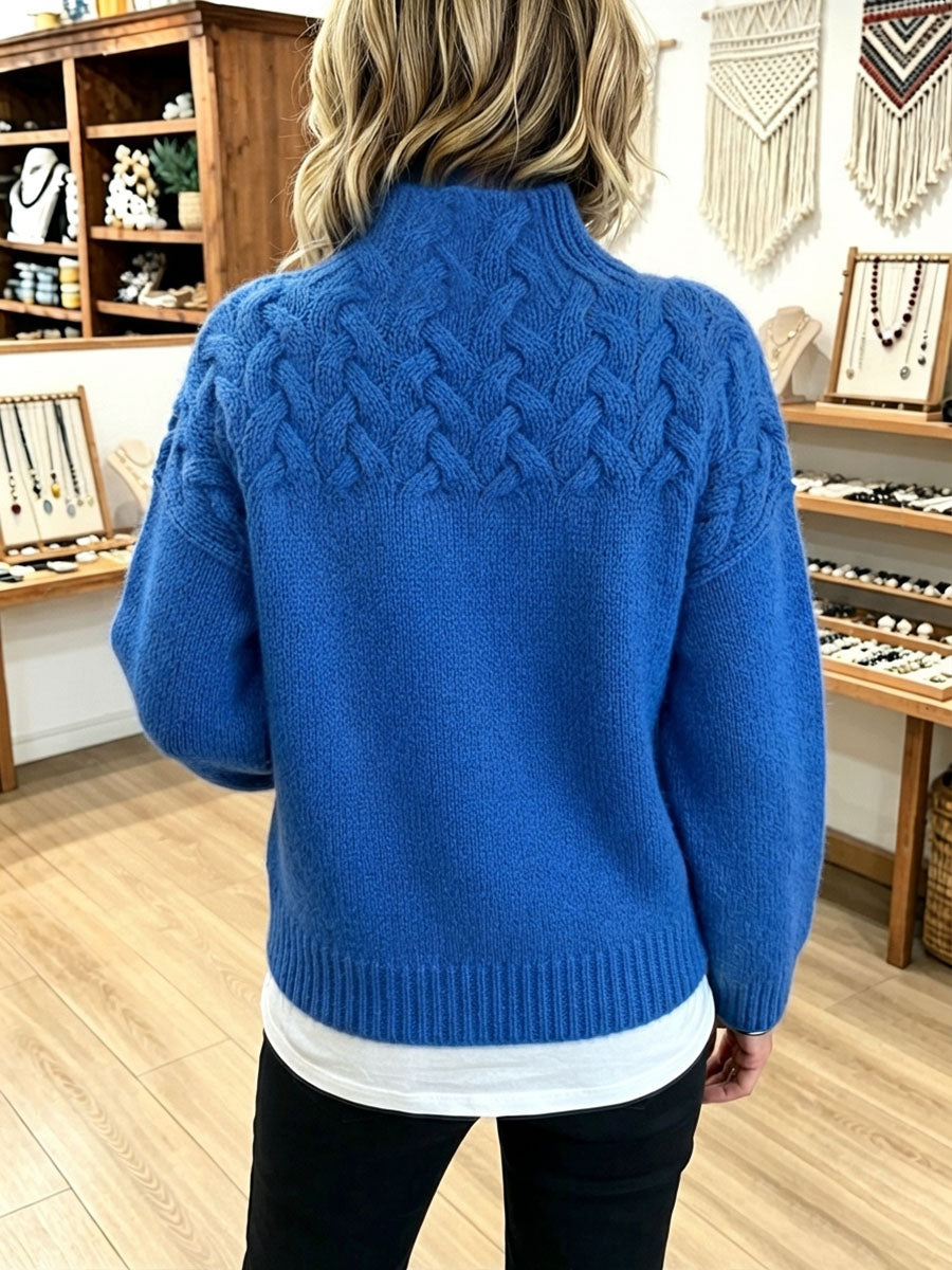 Amelia™ | Maglione a collo alto lavorato a maglia a treccia in stile basket